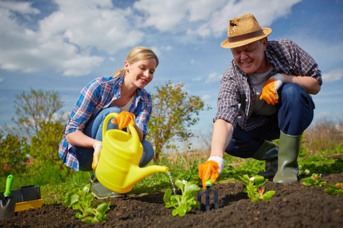 Keyboard and gardening tools on a table emphasizing accessibility